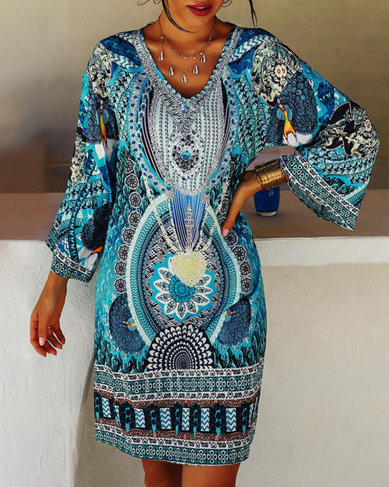 Emelia – Vestido estampado boêmio vibrante